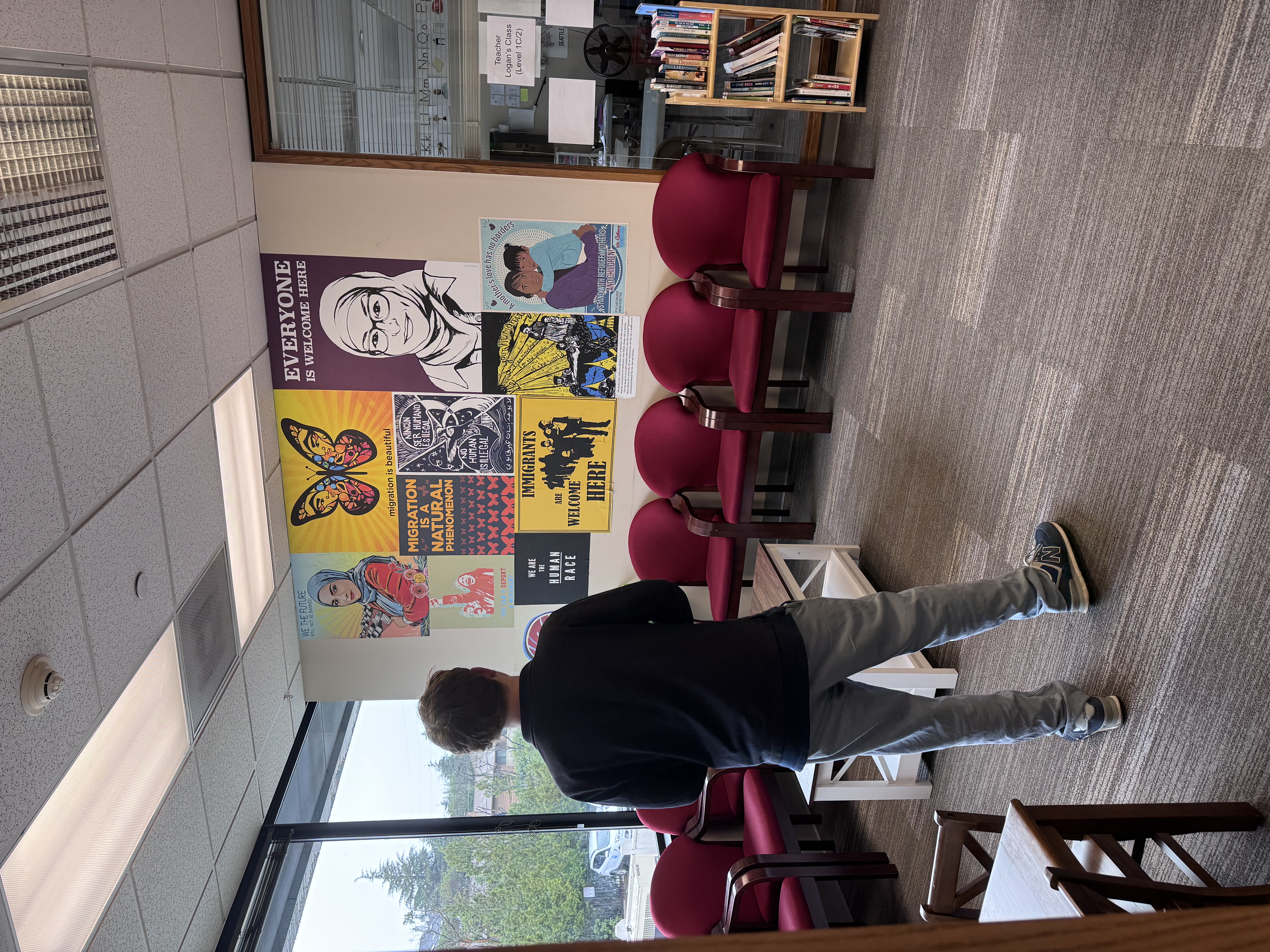 Waiting room with immigration and welcome posters
